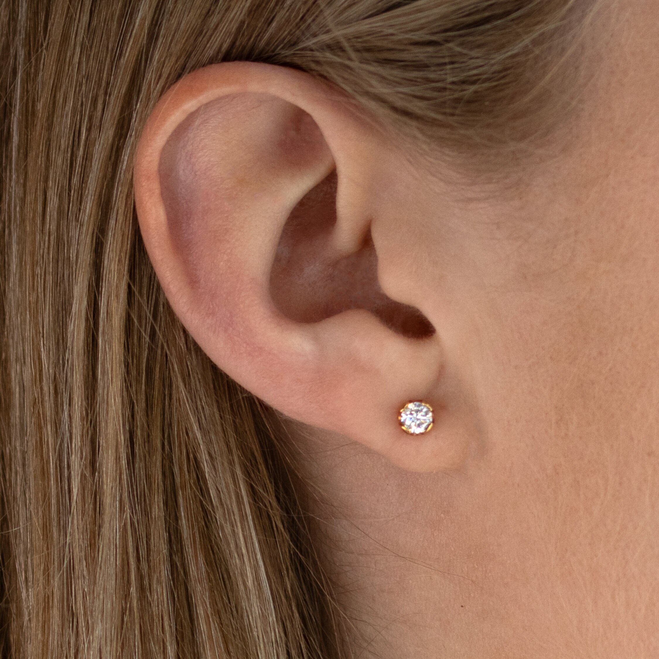 Agnes örhängen 18K rödguld 2x0,25 ct