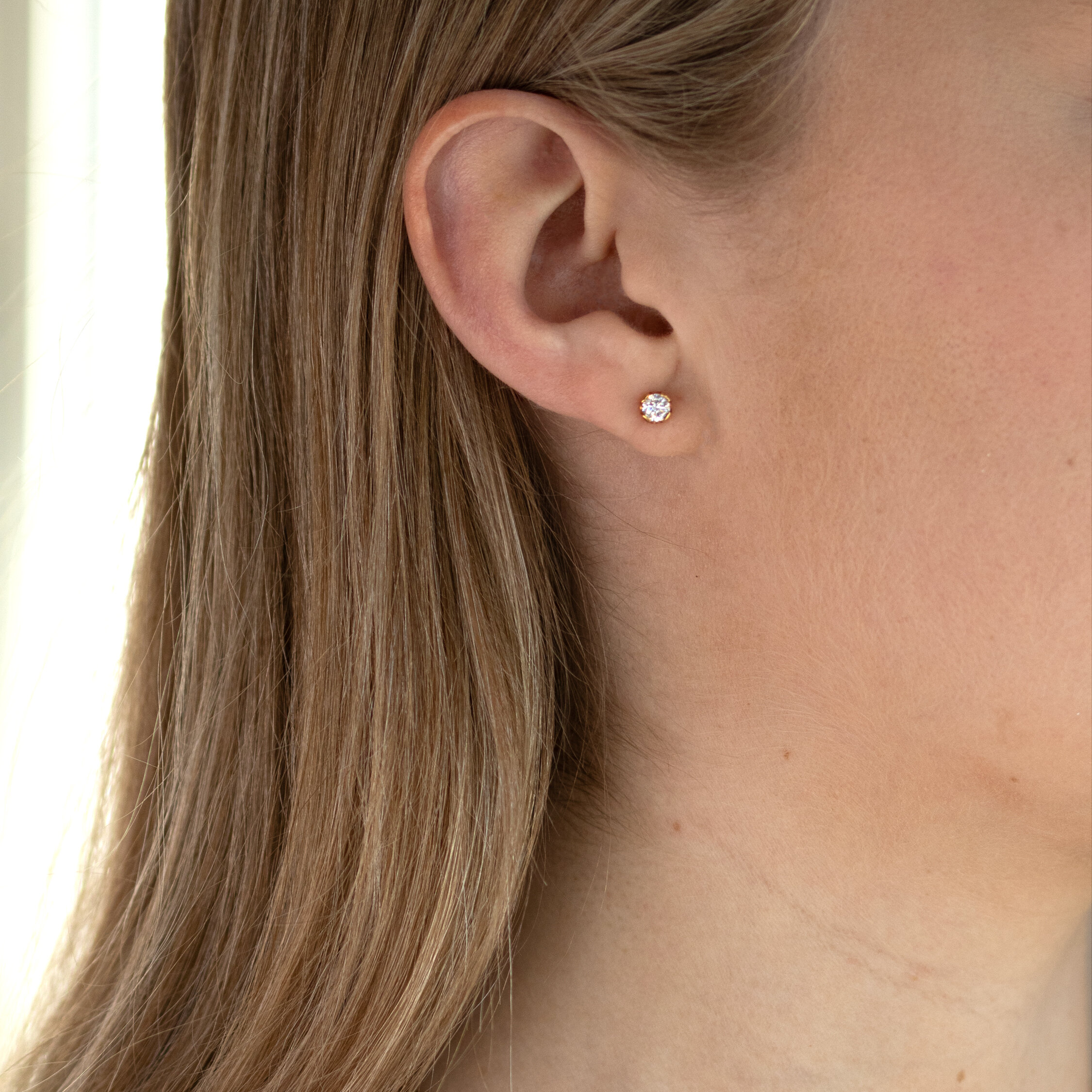 Agnes örhängen 18K rödguld 2x0,25 ct