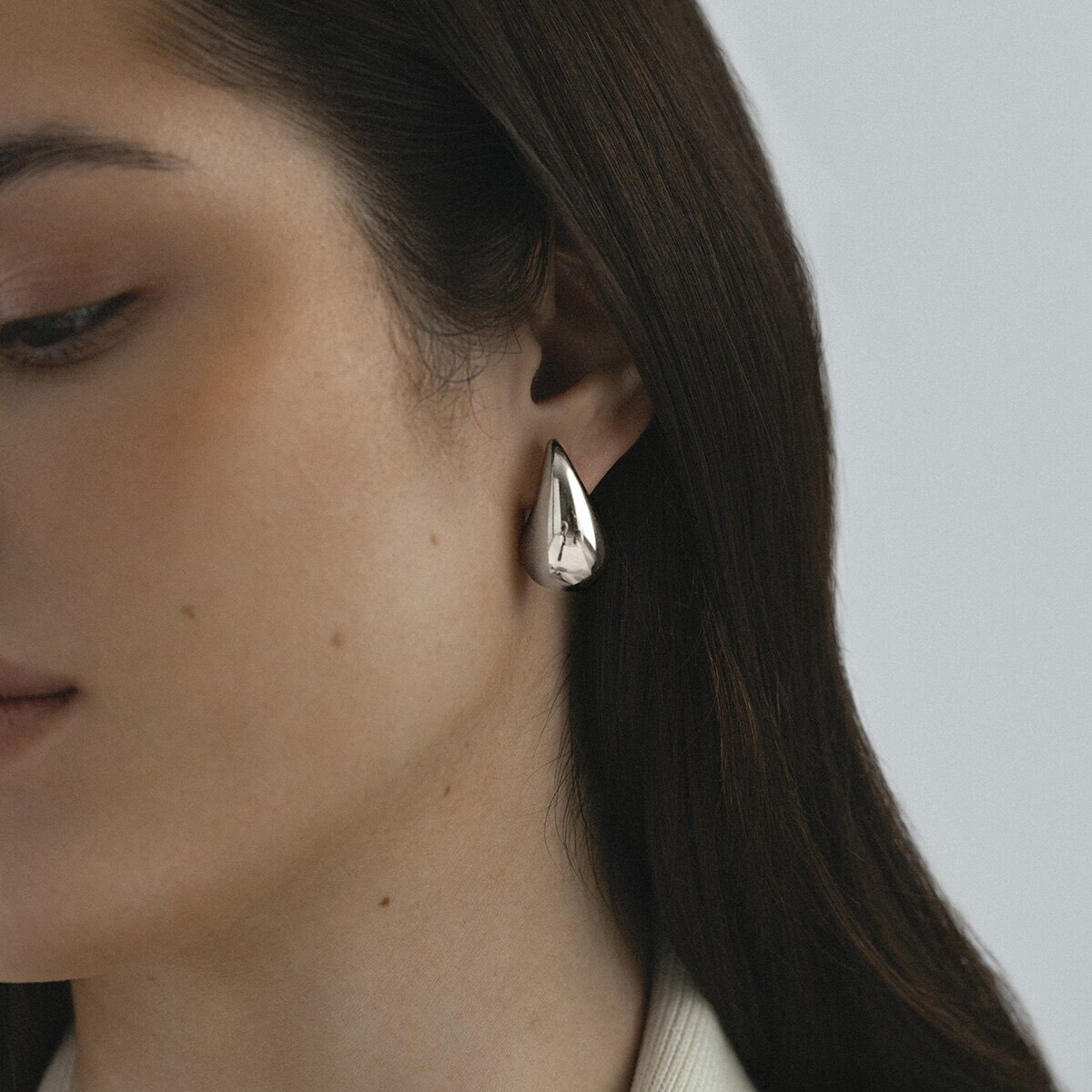 Plain daring large silver dupe earring