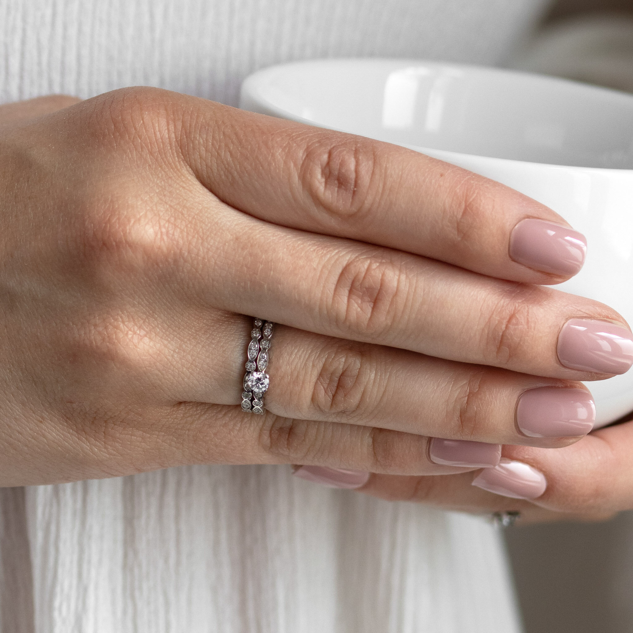 Mila 0,11 ct vitguld