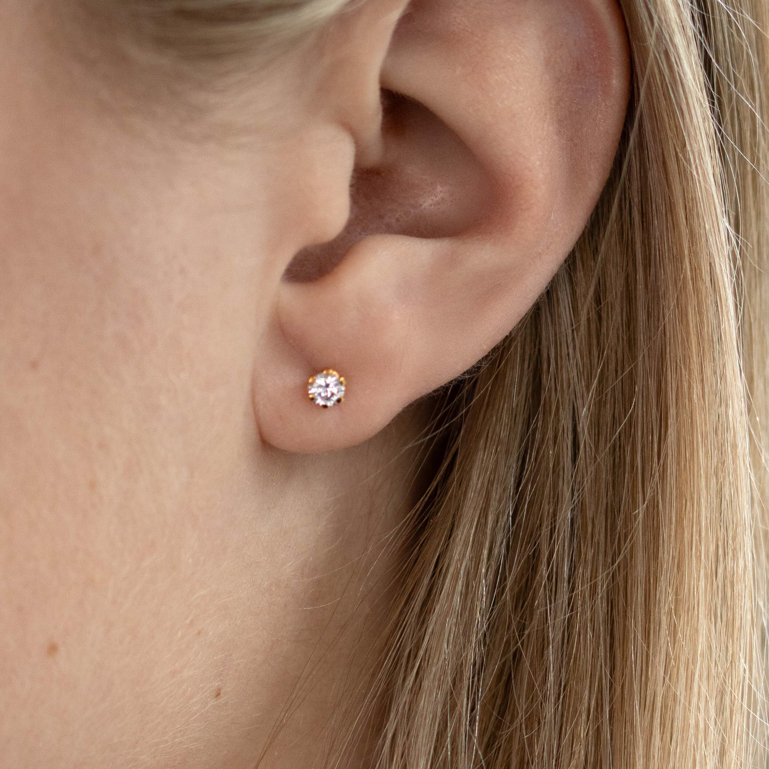 Meja örhängen 2 x 0,15ct 18K rödguld