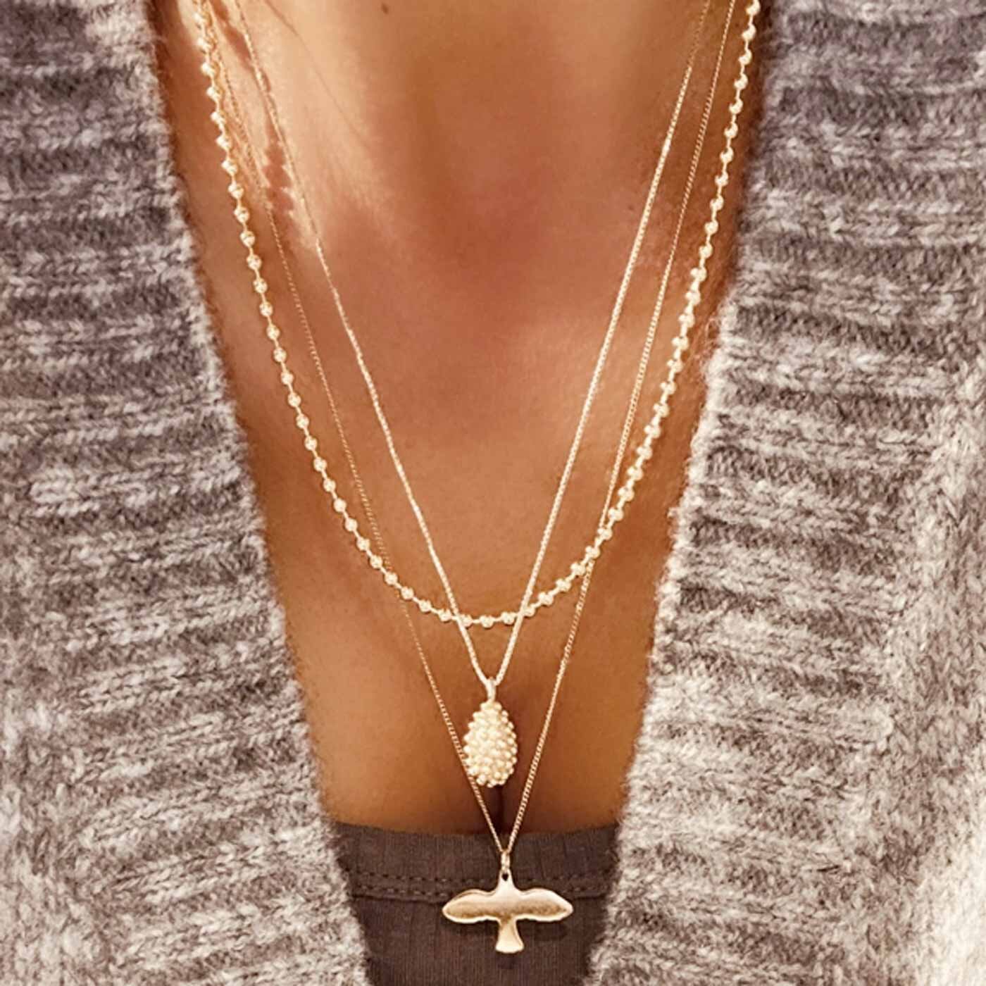 Golden Small Dove necklace