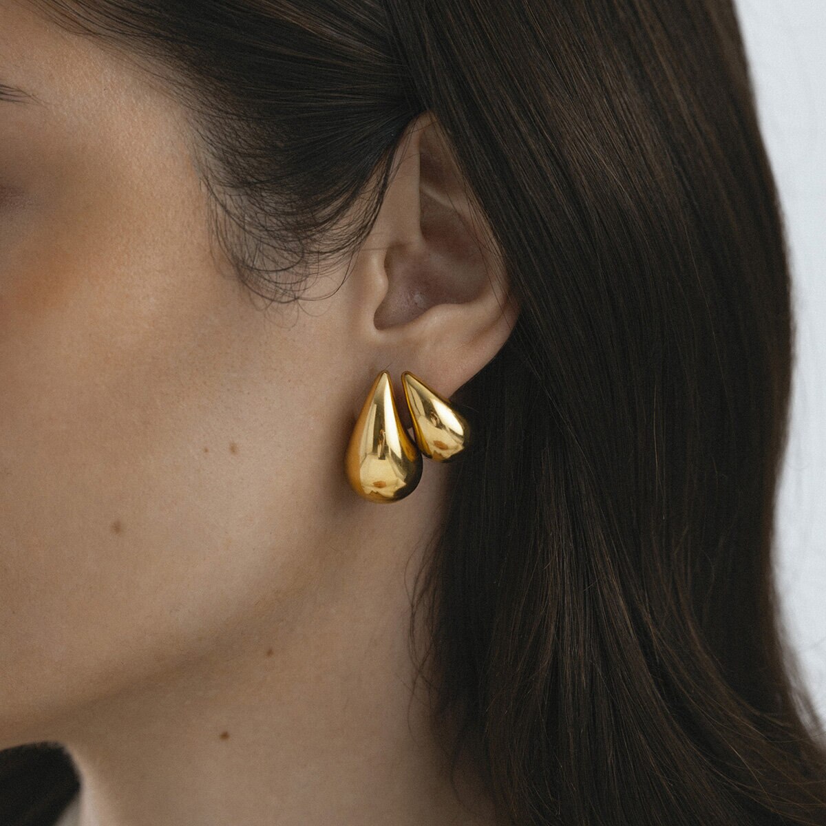 Plain daring large gold dupe earring